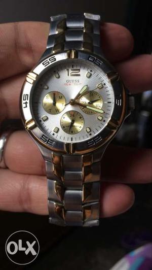 Round Silver And Gold Guess Chronograph Watch With Silver