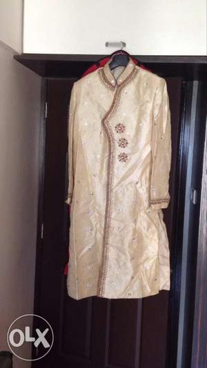 Sherwani with pajami and red stole bought from