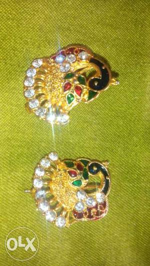 Two Gold And Green Earrings