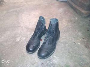 Two Pairs Of Black Leather Shoes