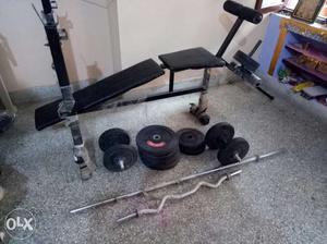 Black Bench Press And Weight Plate Lot
