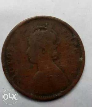 Man's Profile Bronze Coin