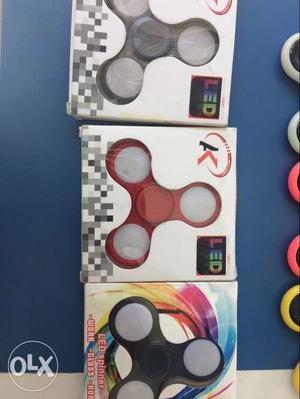 Red, And 2 Black Fidget Spinners each 150