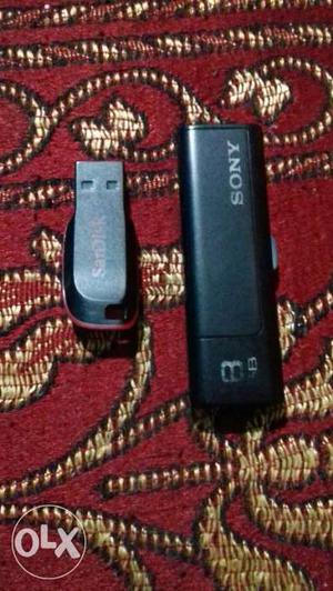 Black 8 GB Sony Thumb Drive; SanDisk Cruzer Blade