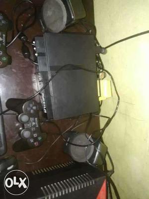 Black Sony PS2 Console And Two Controllers