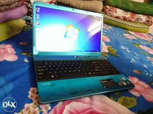 Blue And Black Laptop Computer