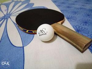 Brown Wooden Handled Black Table Tennis Paddle And White
