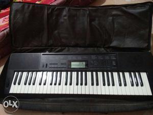 Casio keyboard with pitch bender and soft case