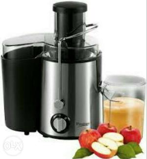Gray And Black Juice Extractor