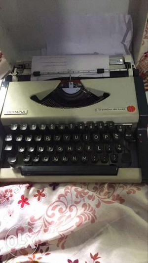 Gray And Black Metal Typewriter