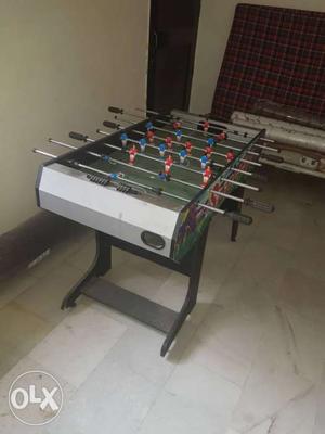 Green And White Foosball Table