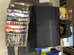 PS3, around one year old, good condition, with 9