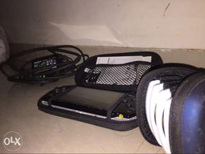 Psp with charger cover and games(optional)