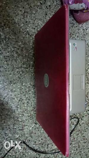 Red And Silver Dell Laptop
