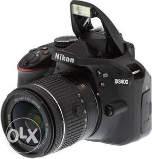 Seal packed Nikon D cemera with  lence. Urgent