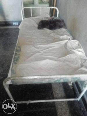 That's a bed in a good condition without mattress