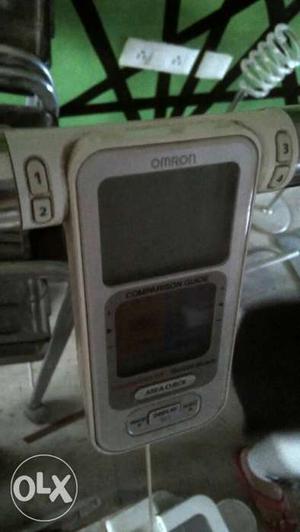 White And Gray Omron Digital Device