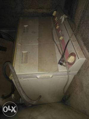 White Top-load Washer And Dryer Combo Unit
