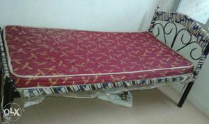 6 ft Rot Iron Cot with mattress.