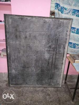 A thick ply blackboard for teachers use