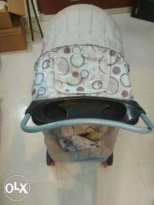 Baby pram in blue n grey colour combination. in