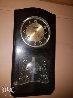 Black And Gold Pendulum Clock