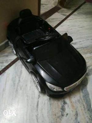 Black Car battery charged 1yr used but good condition with