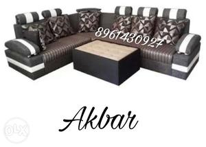 Black, White, And Gray Fabric Corner Sofa And Ottoman