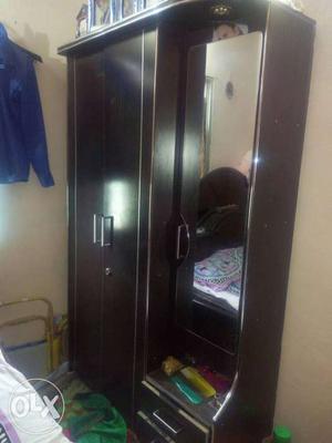 Black Wooden Armoire With Mirror