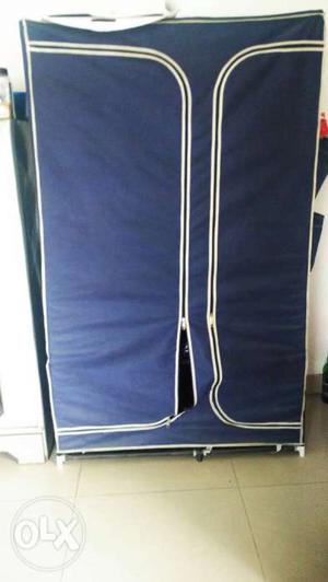 Blue And White Fabric Clothes Organizer