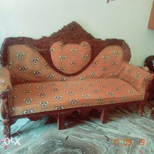 Brown Wooden Framed Orange And White Padded Sofa