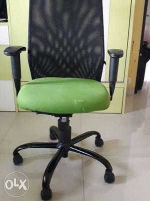 Green And Black office chair.