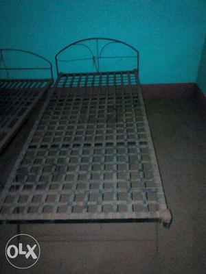 Iron bed set of 2 single beds