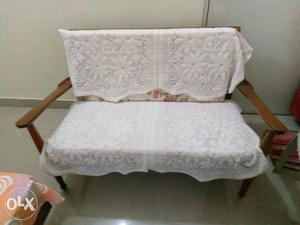 One sofa of teak wood. Used. Good condition with