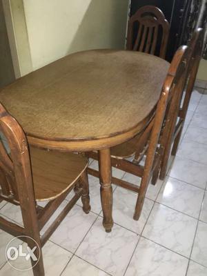 Oval Brown Wooden 4 chairs Dining Table Set