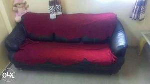 Red And Black Leather Padded Sofa