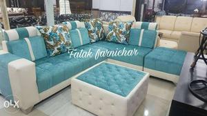 Teal-and-white Sectional Couch And Ottoman
