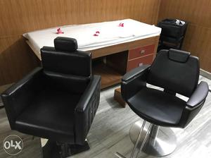 Two Black Leather Salon Chairs