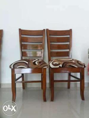 Two Brown Padded Chairs