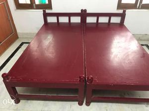 Two Red Wooden Bed Frame