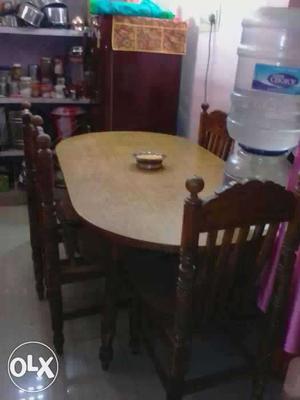 Very nice dinning table with 4 chairs 1 year old