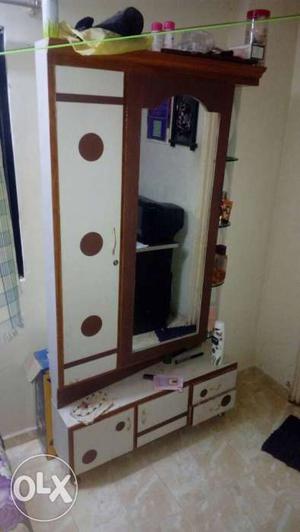 White And Brown Wooden Cabinet With Mirror