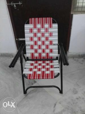 White And Red Rattan Seat Armchair With Black Metal Base