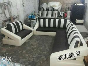 White Leather Framed Black Fabric Sectional Sofa With Throw