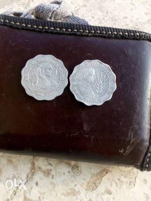 A pair of 10 Paisa Coin embossed with Rural