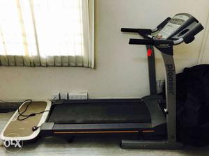 Black And Gray Pioneer Automatic Treadmill