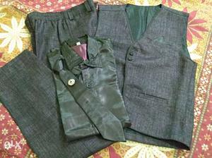 Boys coat-pant shirt tie set in new condition.
