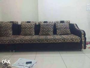 Brown And Black Couch And Pillow