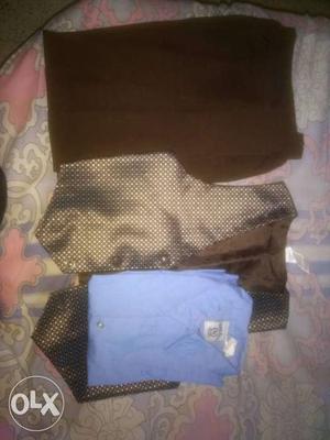 Brown pant, blue shirt, brown and blue cotty for