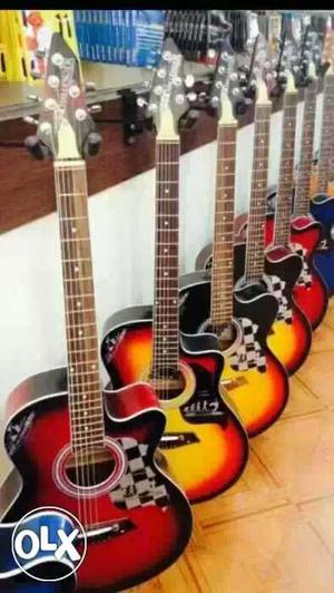 Five Cutaway Acoustic Guitars